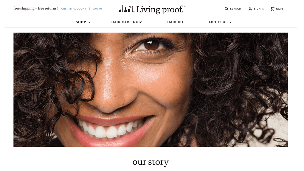 A smiling woman with the words 'our story' below